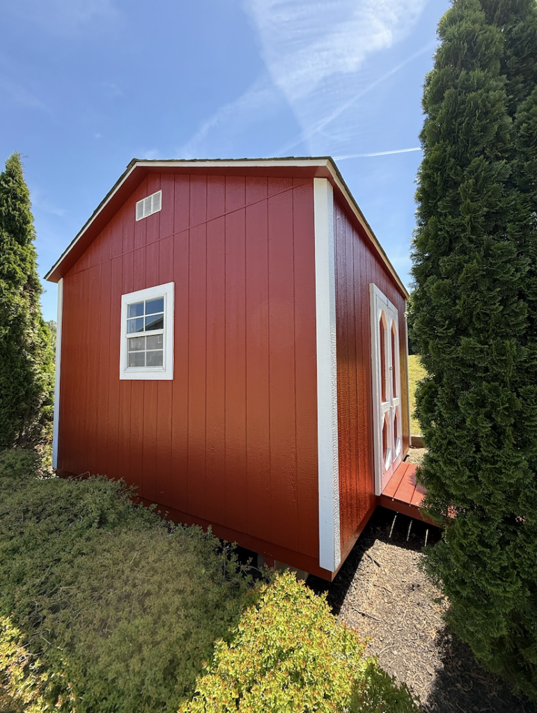 Outdoor Shed with a fresh coat of nice brick red paint
