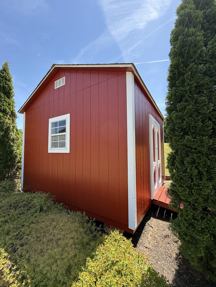 Outdoor Shed with a fresh coat of nice brick red paint
