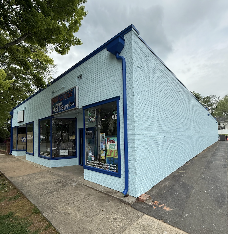 a freshly coated exterior of a commercial building